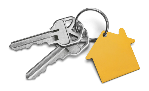 Set of Keys With Yellow House